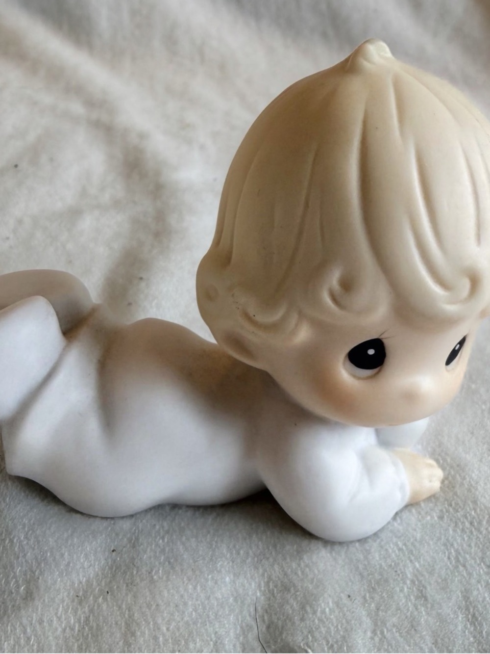 Precious Moments Cream and White Lying Baby Figurine